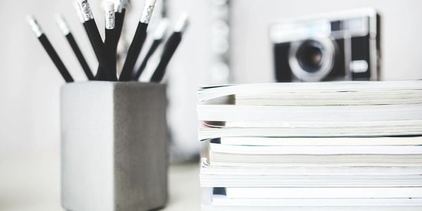 Desk with pencils and paper