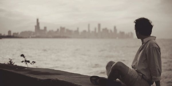 A person looking at the sea