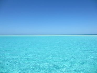  view of a ocean under a clear blue sky