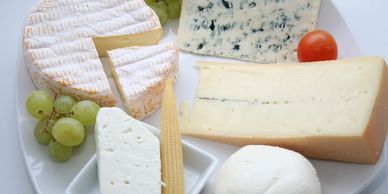 Picture of foods that contain dairy, cheese, milk, and lactose,