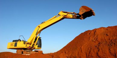 Yellow digger at a building site