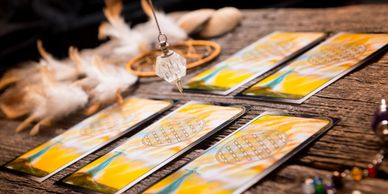 Cards and a crystal pendant