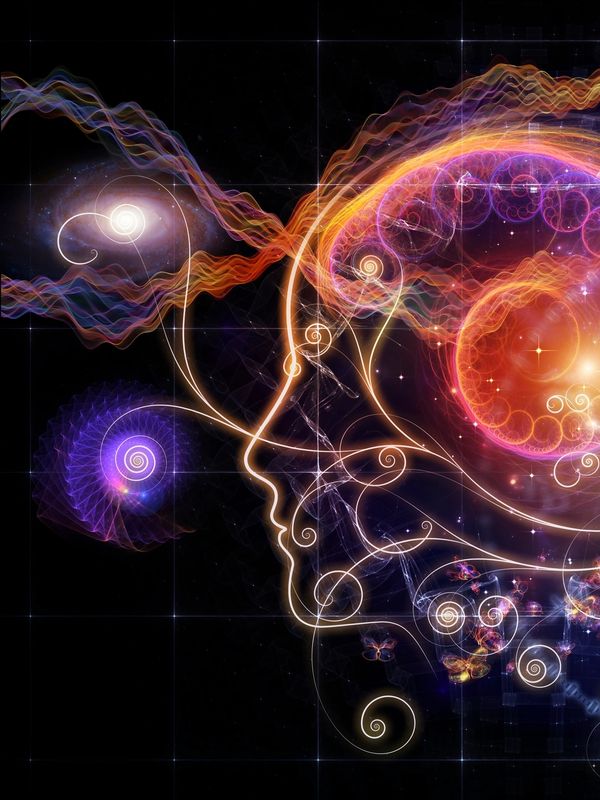 Abstract glowing human profile with spirals and vibrant cosmic patterns.
