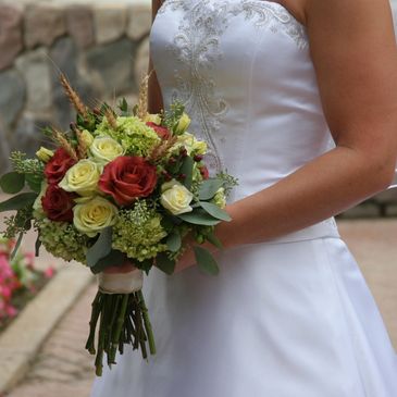 Women hold the bouquet on hand