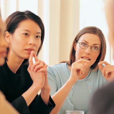 A stock image showing female students during a lesson