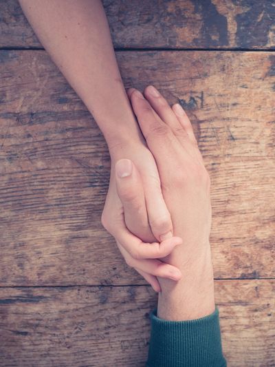 Connection: Two People Holding Hands