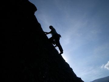 A challenging uphill climb up a mountain. 