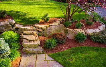 Rock / Boulders / Mulch flowerbed installation 