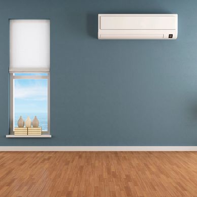 a room with a wall-mounted AC