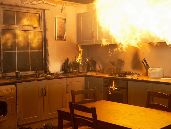 Kitchen engulfed in flames from a fire outbreak.