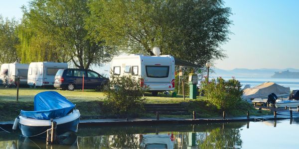 Camping on a lake and relaxing is just one of the many relaxing days the RV lifestyle offers