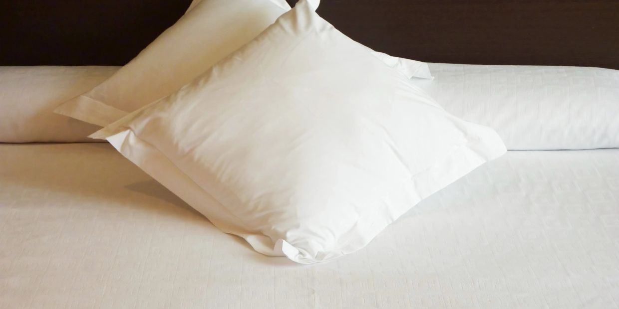 White pillows on bed