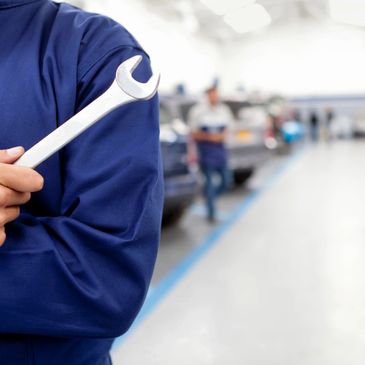 Technician holding a spanner