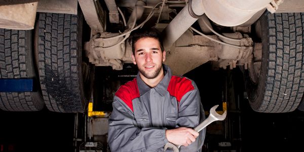 Mechanic holding french wrench key