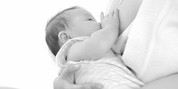 Baby breastfeeding- Geaux Dat Doula