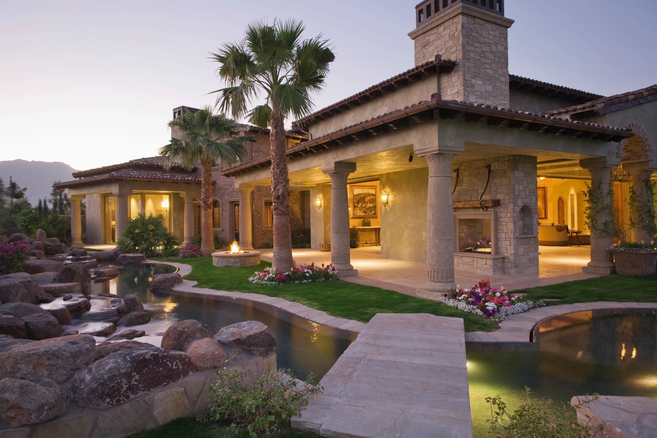 Luxury real estate in Florida with firepit and palm trees
