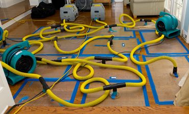 drying equipment after a water damage on a gymnasium floor