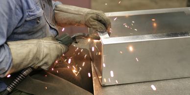 welder, welding with gloves and sparks