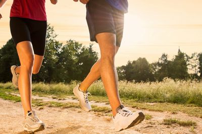 Let's Run Coaching - running coaching blogs - two runners on a trail path