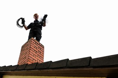 Chimney and fireplace cleaning in progress in St. Charles, MO