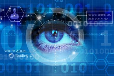 A digital eye scan with verification loading and binary code in blue tones.