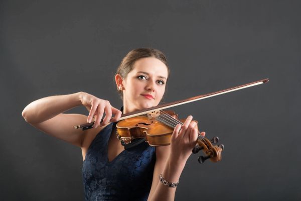 Woman playing the violin.