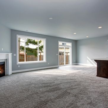 Soft Stain proof carpet in Family Room. Waterproof flooring in Kitchen