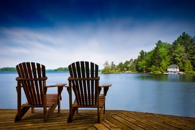 Chairs placed for view across lake