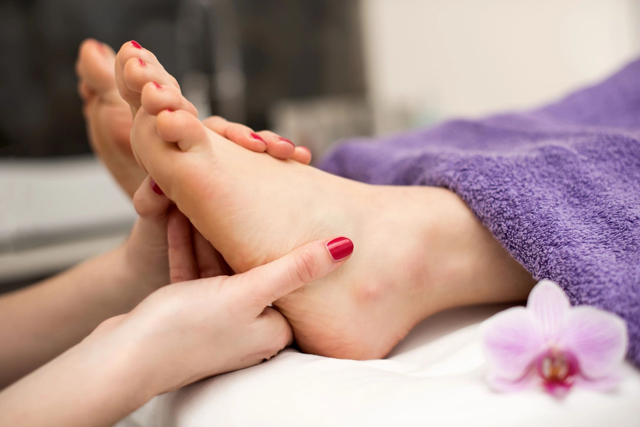 Woman getting pedicure services