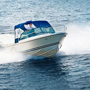 a power boat cutting through the water