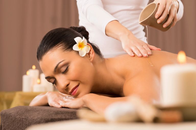 Women Beauty in salon, getting massage and body treatment. 