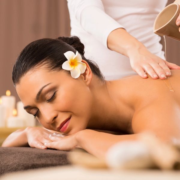 woman enjoying massage therapy