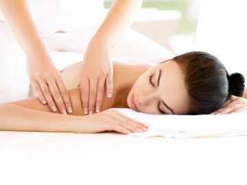 Woman receiving a shoulder massage.