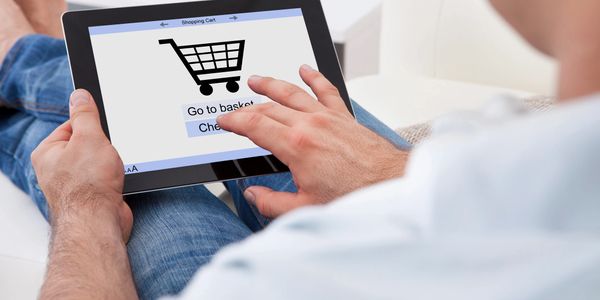 closeup shot of a man checking out for shopping 