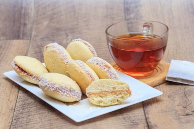 Tea & Crumpets - We celebrate motherhood with giggles and conversation.