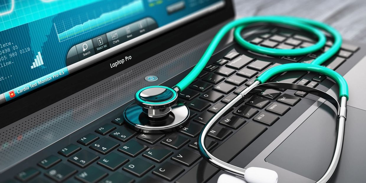 A picture of a stethoscope on the laptop