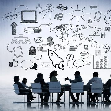 Business team discussing global strategy with illustrated icons.