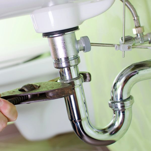 An example of repairing a leak under a bathroom sink.