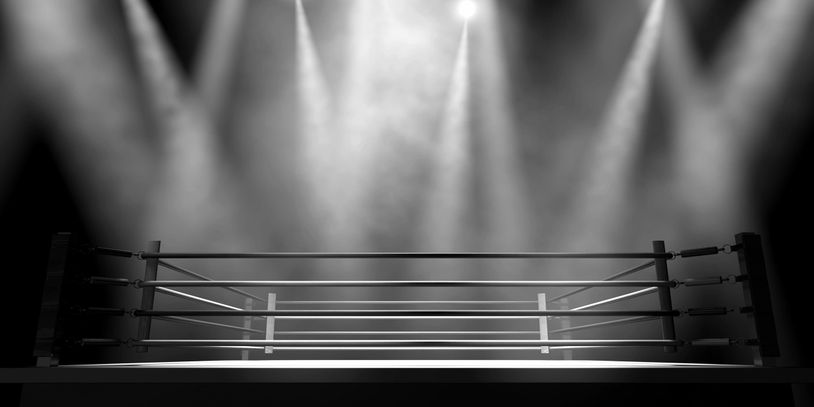 An empty boxing ring depicts a safe space for a divorcing couple to discuss the details of divorce w