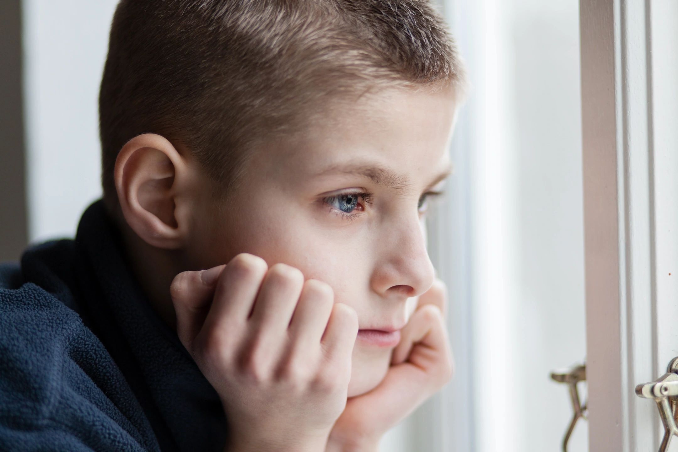 Boy looking sad.
