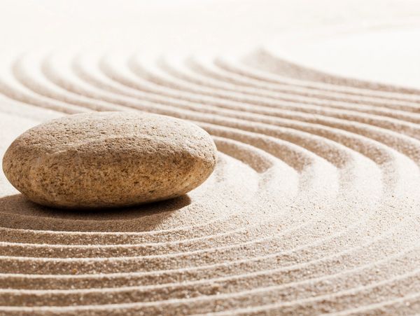 zen sand garden with stone