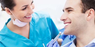 A man has a dental check up at Castle Street Dental Practice in Canterbury.