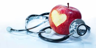 Image of apple and stethoscope 