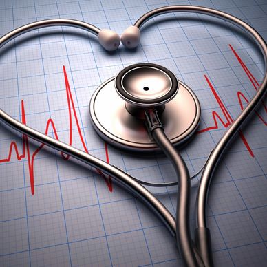 Stethoscope shaped into a heart over an ECG graph.