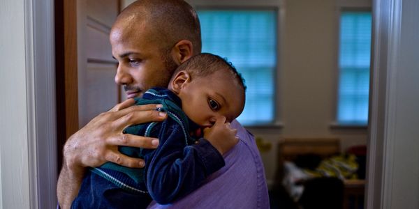 Father soothing infant