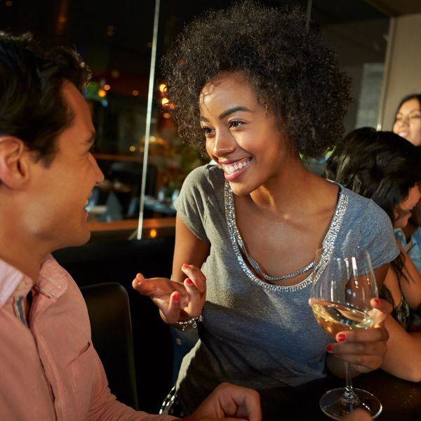 A group of people gathering at a local bar 