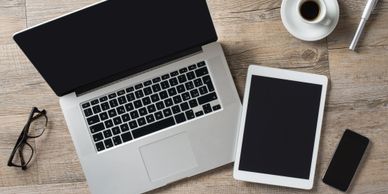 Laptop and tablet on a table