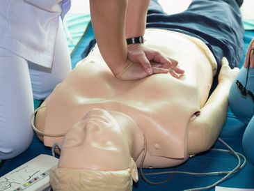 giving CPR and using AED