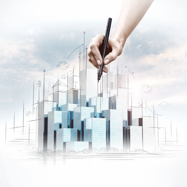 Hand drawing a conceptual cityscape with modern skyscrapers and architectural lines.