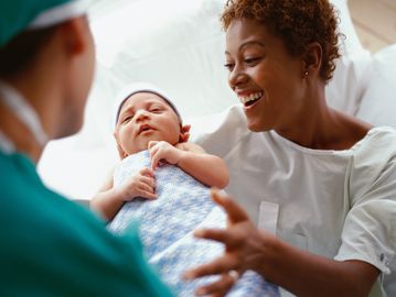 New mom holding her new baby 